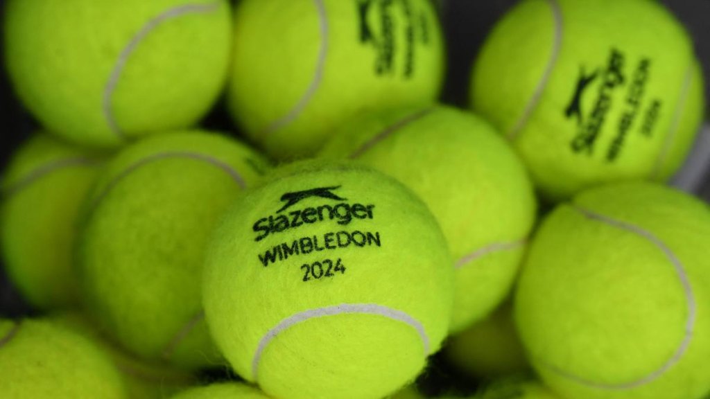 Wimbledon 2024 branded tennis balls are pictured on the eve of the 2024 Wimbledon Championships at The All England Lawn Tennis and Croquet Club in Wimbledon, southwest London, on June 30, 2024.