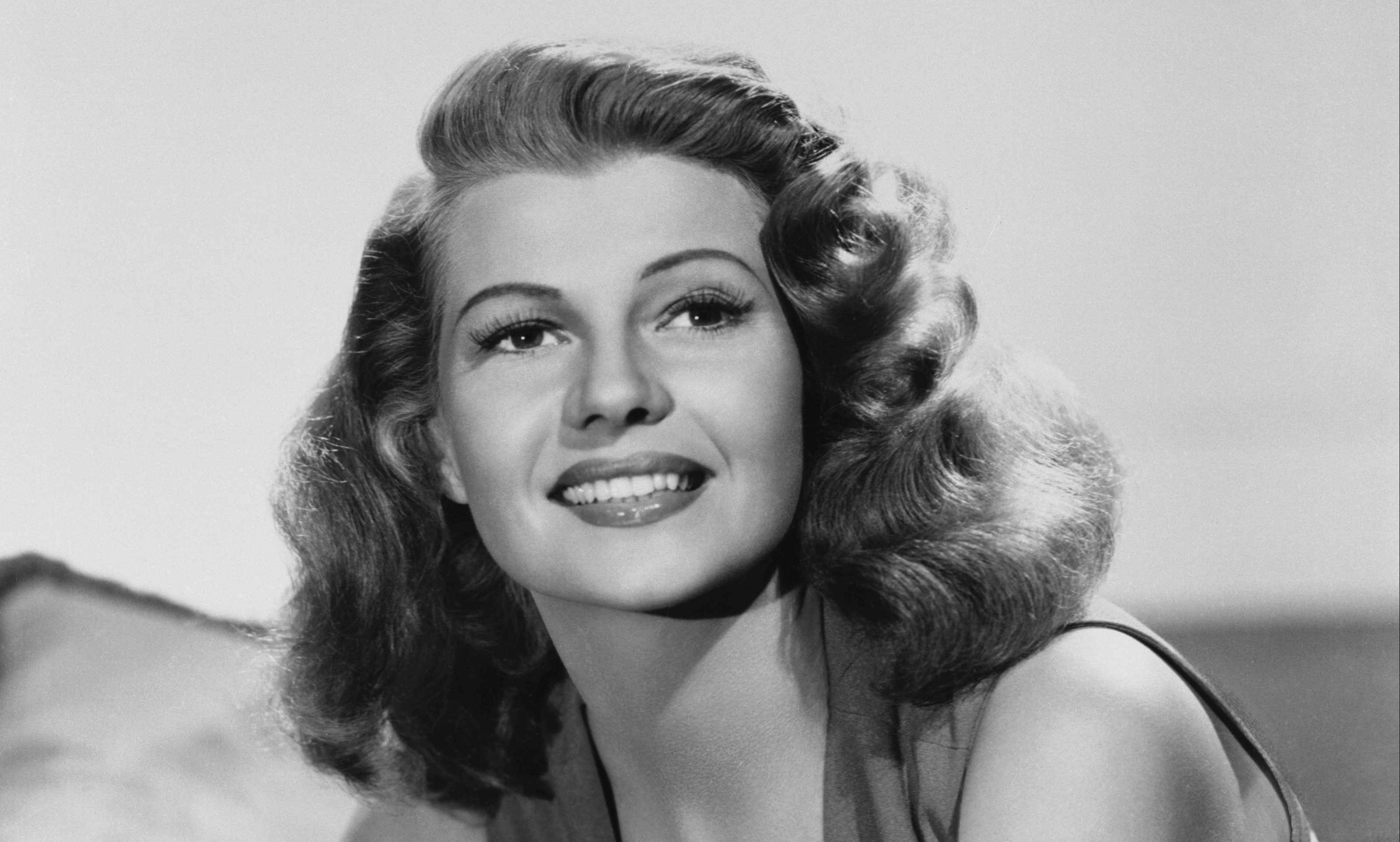 woman smiling; rita hayworth young