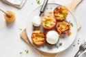 Grilled peaches on a platter