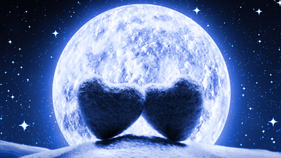 two hearts in front of a moon