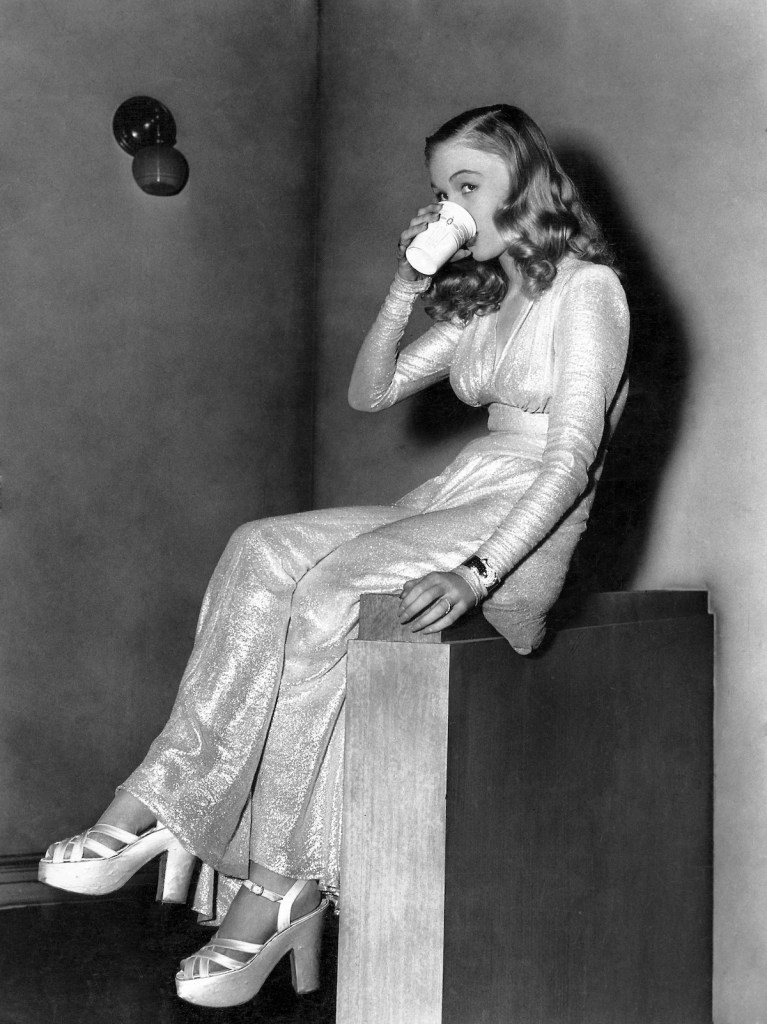 Veronica Lake, Drinking Cup of Water on-set of the Film This Gun for Hire, 1942