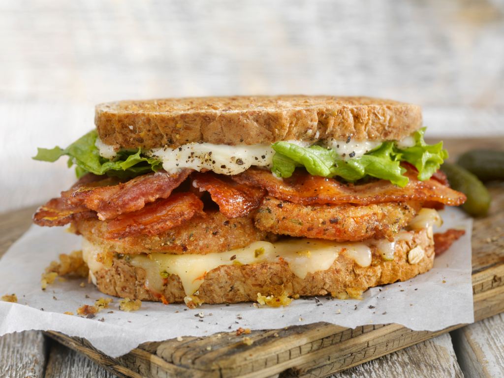 A BLT sandwich with fried green tomatoes