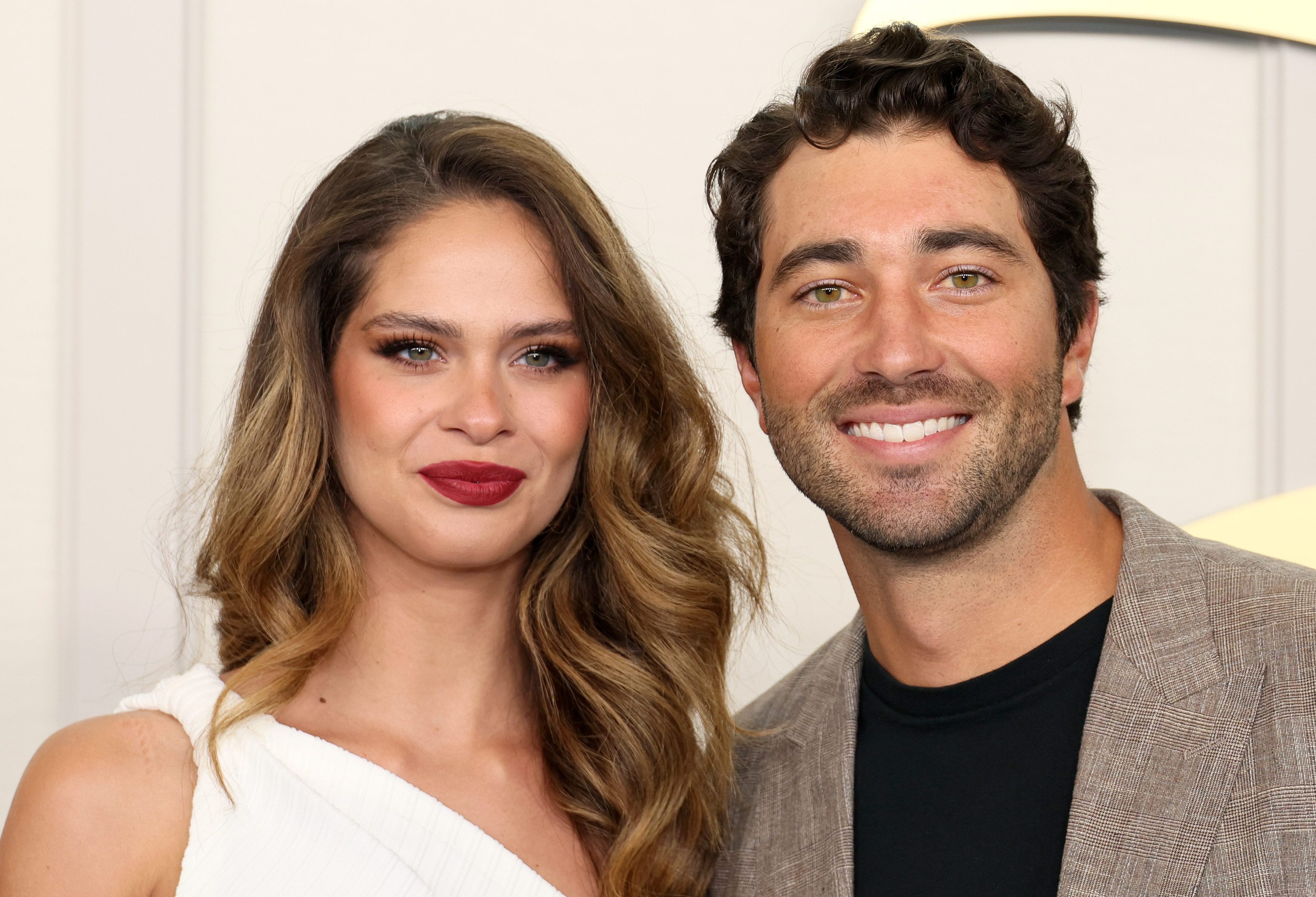 man and woman smiling; best bachelor season