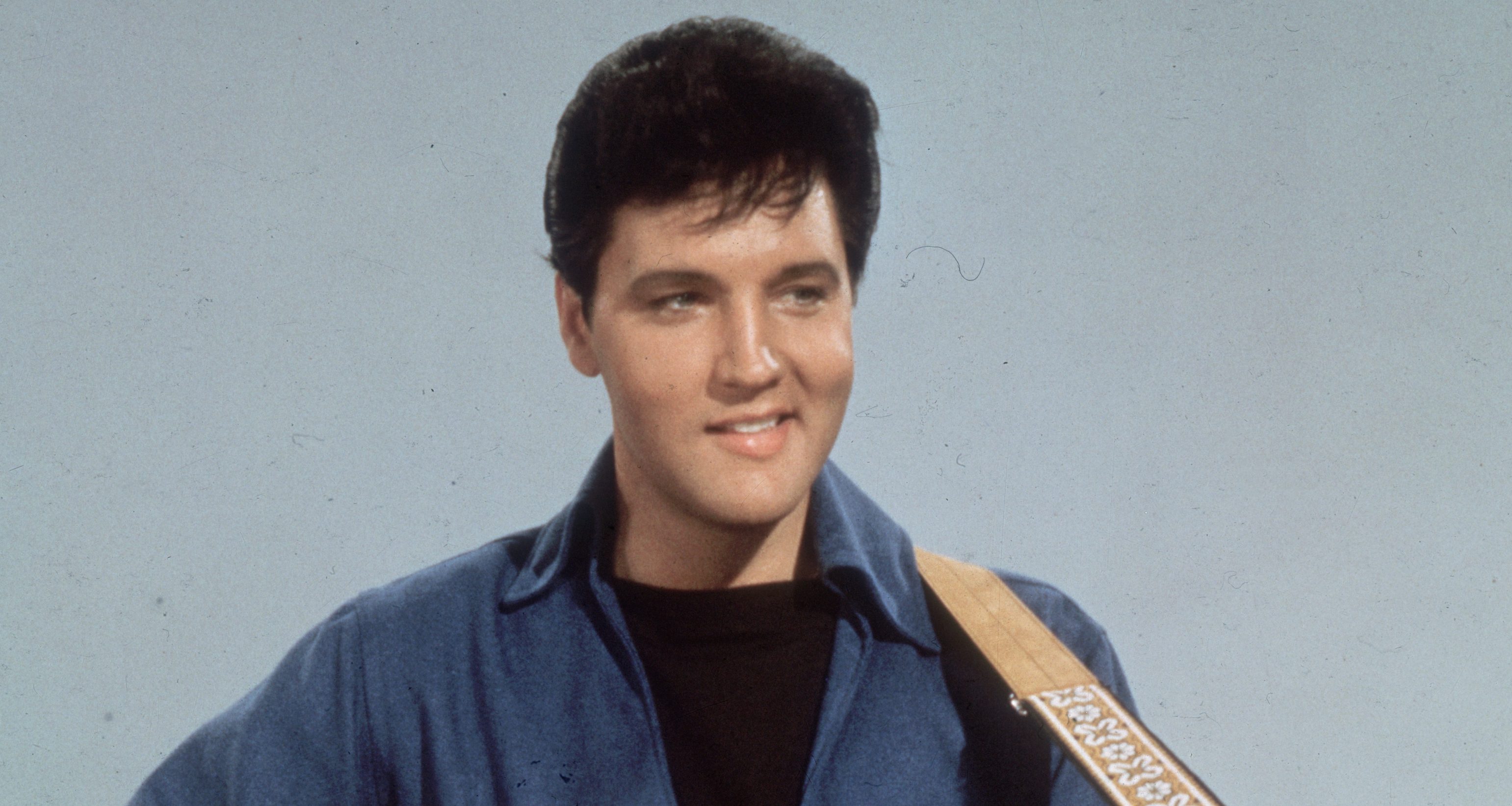man smirking; best elvis songs