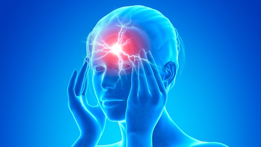 A woman who's dealing with a headache behind the eyes