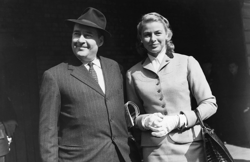 man and woman smiling; old hollywood couples