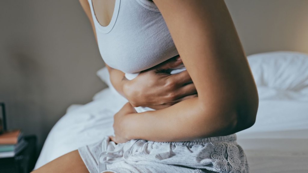holding tummy