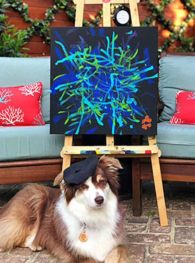 Ivy the dog with painting