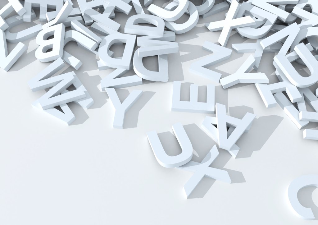 various random letters scrambled on white background, which illustrates the idea of cognitive shuffling