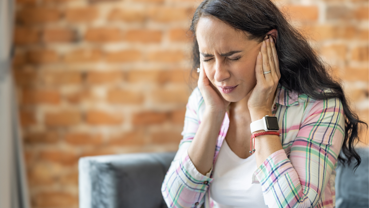 woman having ear pain