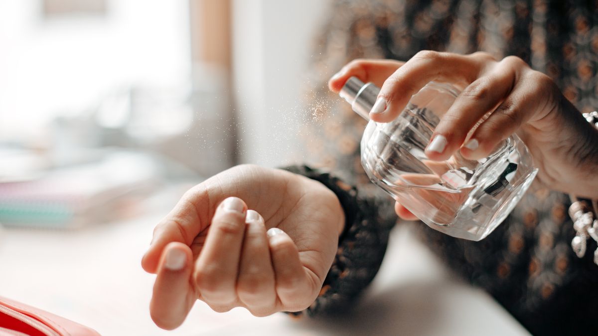 spraying perfume