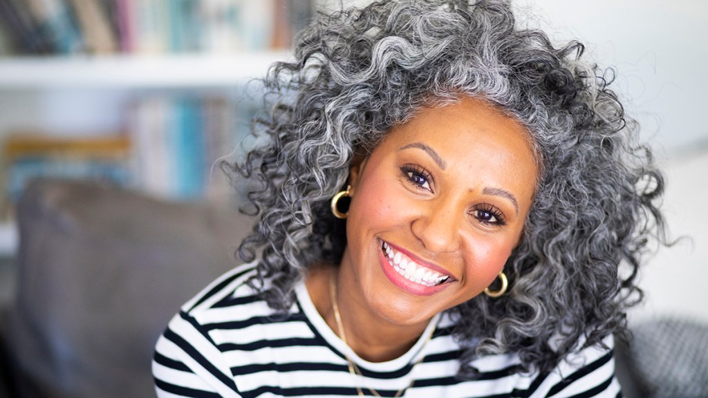 Portrait of a Black woman going gray gracefully