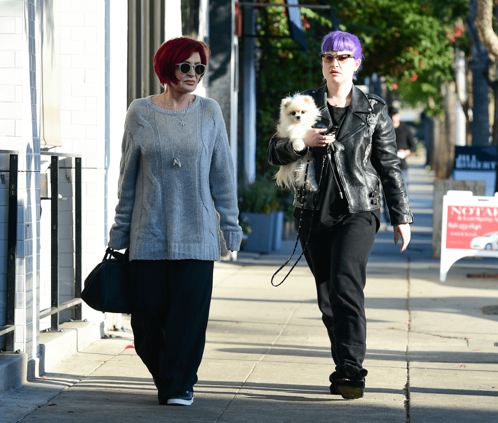 Sharon Osbourne walking next to Kelly Osbourne in NYC in 2019