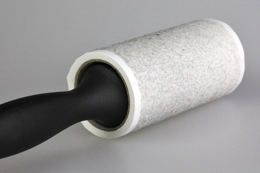 Lint roller with dust on it 
