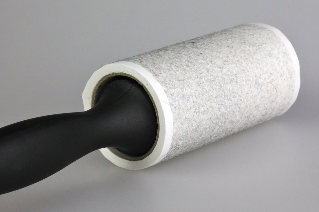 Lint roller with dust on it