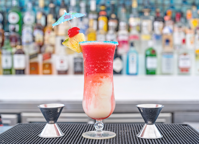 frozen cocktail in hurricane glass