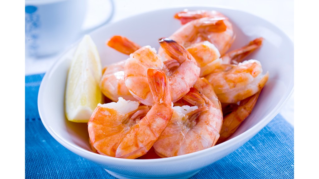 A plate of shell-on shrimp as part of our guide on how to reheat shrimp