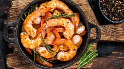 Cast iron pan with sautéed shrimp