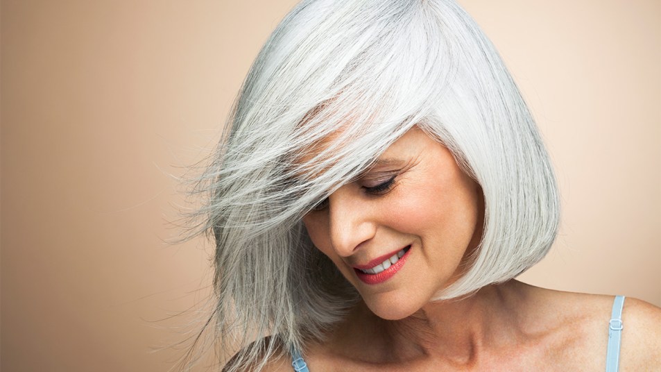 woman with beautiful gray hair after going gray gracefully