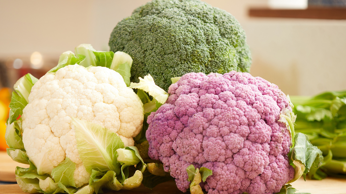 closeup of broccoli, cabbage and cauliflower, cruciferous vegetables that lower blood pressure