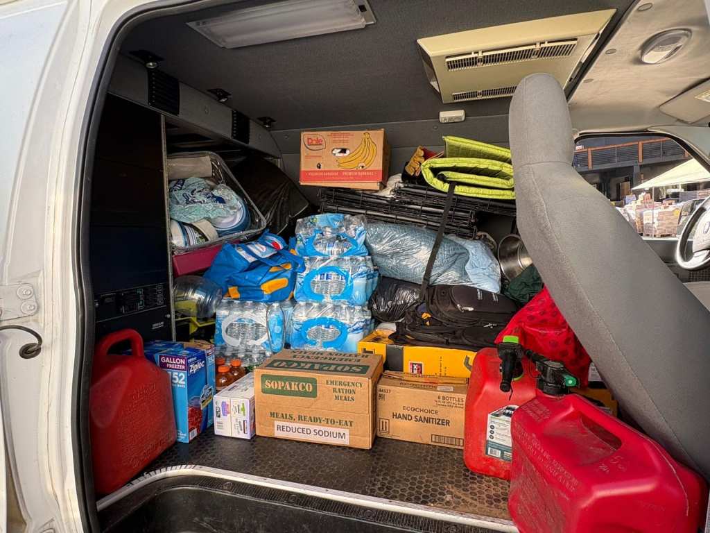 packed van full of necessities including food and water
