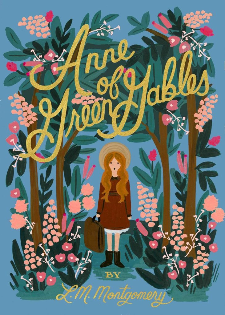 Cozy Fall Reads: Anne of Green Gables by L. M. Montgomery. Book cover shows a hand painted picture of Anne surrounded by blossoming trees