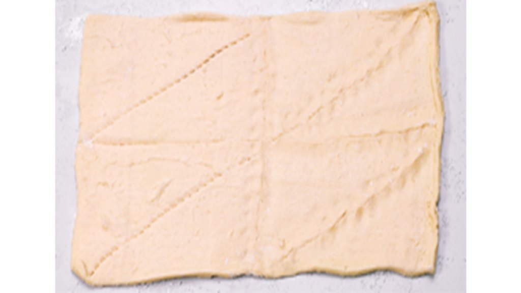 Dough being rolled out