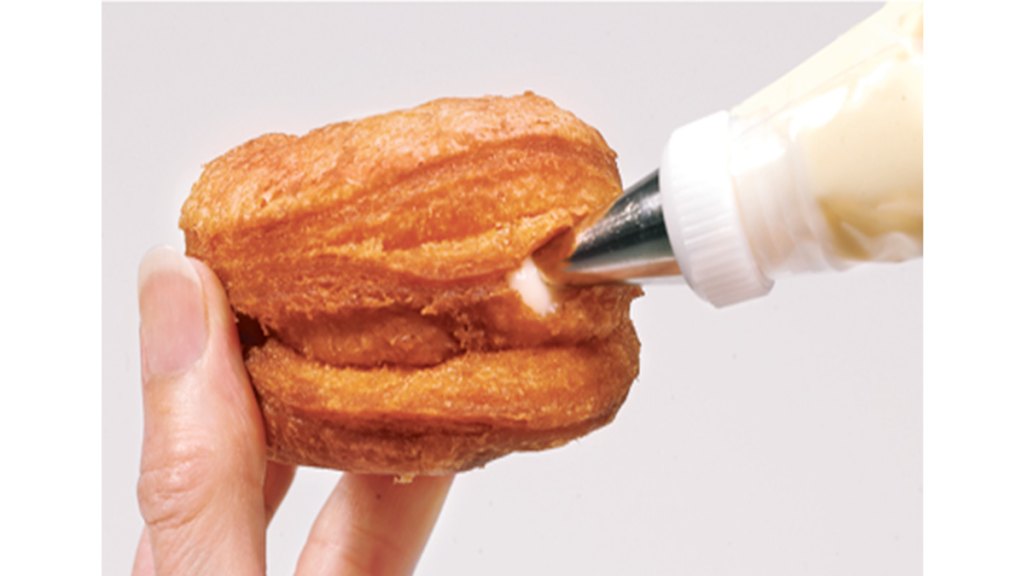 Filling being added to homemade cronuts