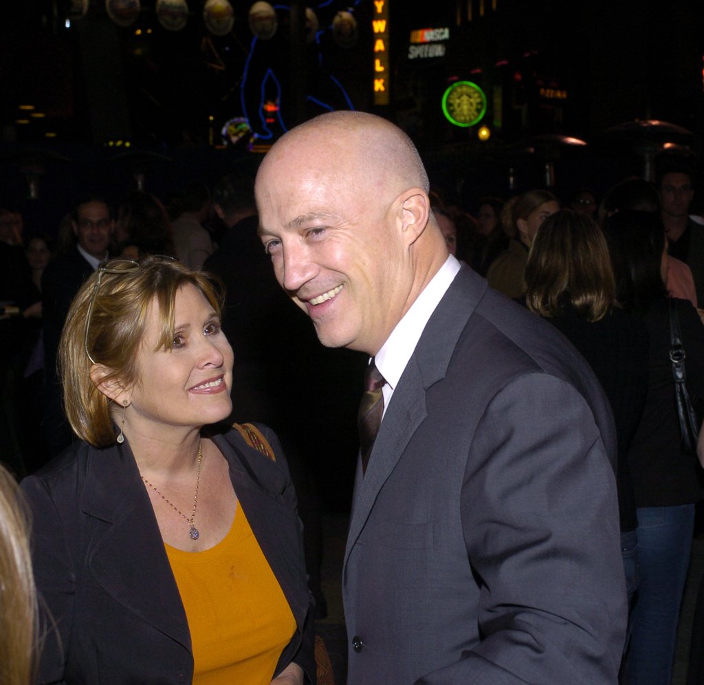Carrie Fisher and Bryan Lourd of CAA during "Connie and Carla" World Premiere - After Party at Universal Studios Cinema in Universal City, California, United States.