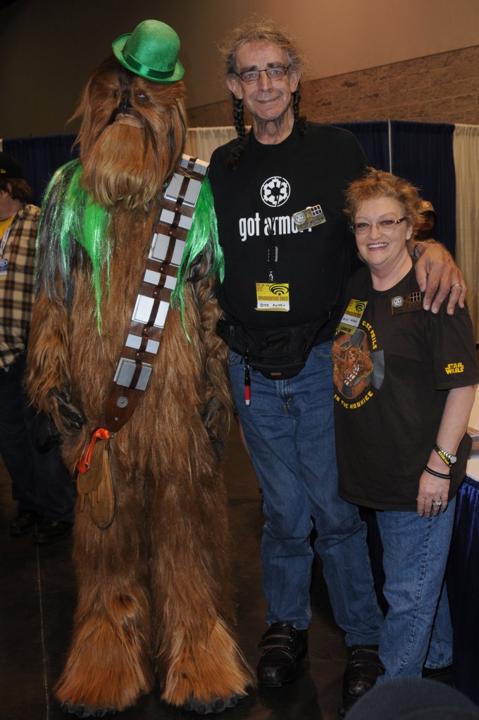 Actor Peter Mayhew and wife Angie Mayhew with Chewbacca participate in the 2012 WonderCon - Day 2 held at Anaheim Convention Center on March 17, 2012 in Anaheim, California. 