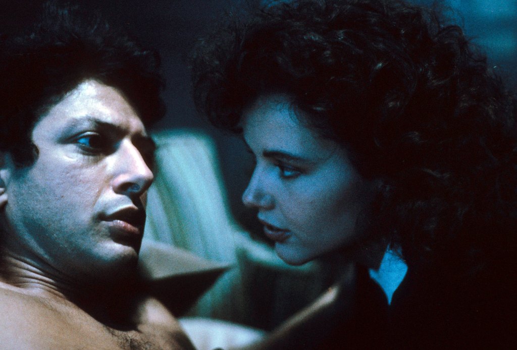 Jeff Goldblum is awakened by Geena Davis in a scene from the film 'The Fly,' 1986.