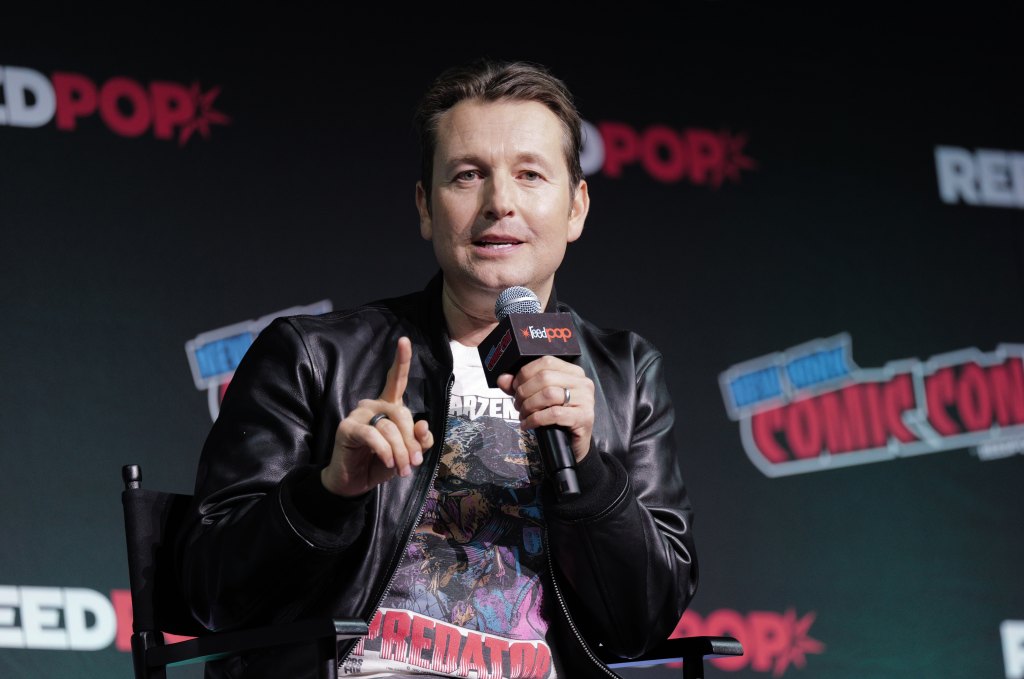 Leigh Whannell speaks onstage at BlumFest NYCC during New York Comic Con 2024 at The Jacob K. Javits Convention Center on October 18, 2024 in New York City. 