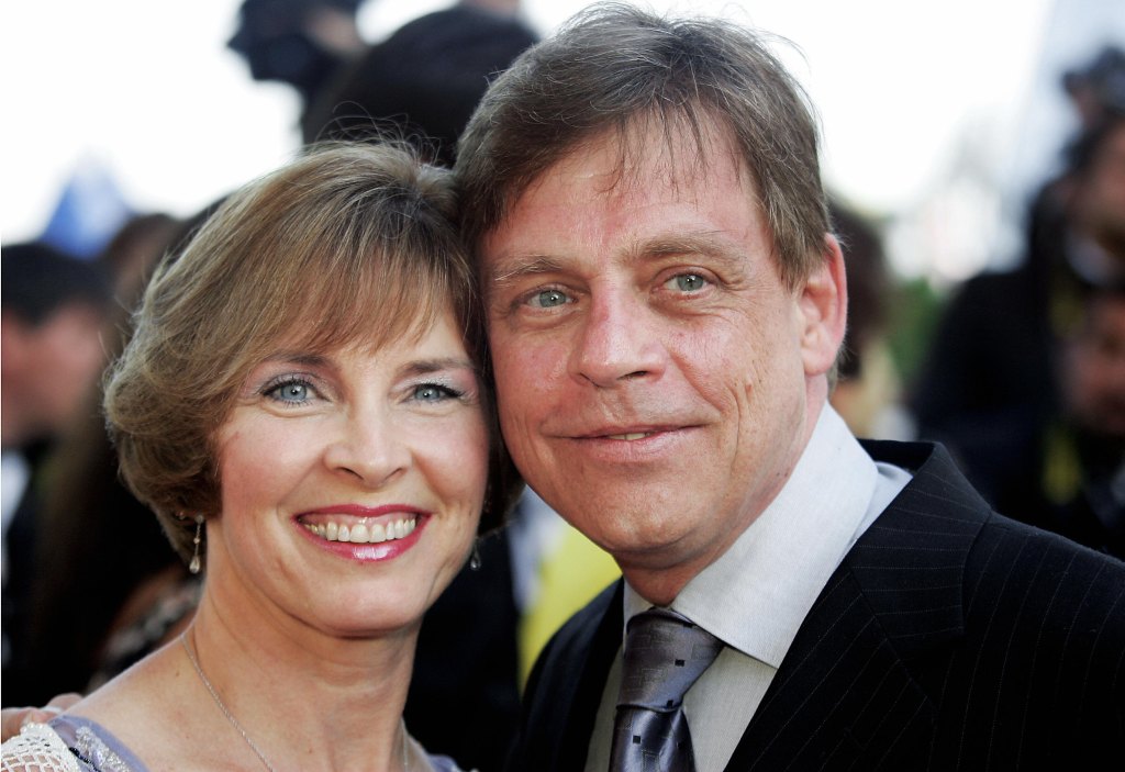The couple arrive for the official projection of the film "The Life and Death of Peter Sellers", 21 May 2004, at the 57th Cannes Film Festival in the French Riviera town. The film, which is competition for the festival's top prize the Palme d'Or, is based on a controversial biography of the "Pink Panther" star by author Roger Lewis.