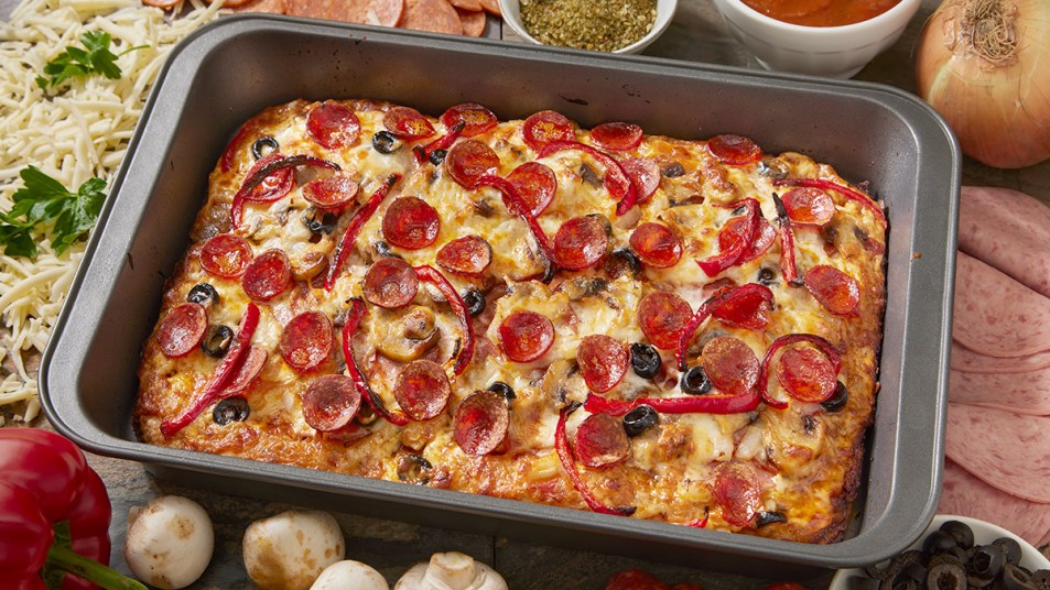 Grandma pizza with toppings in a rectangular pan