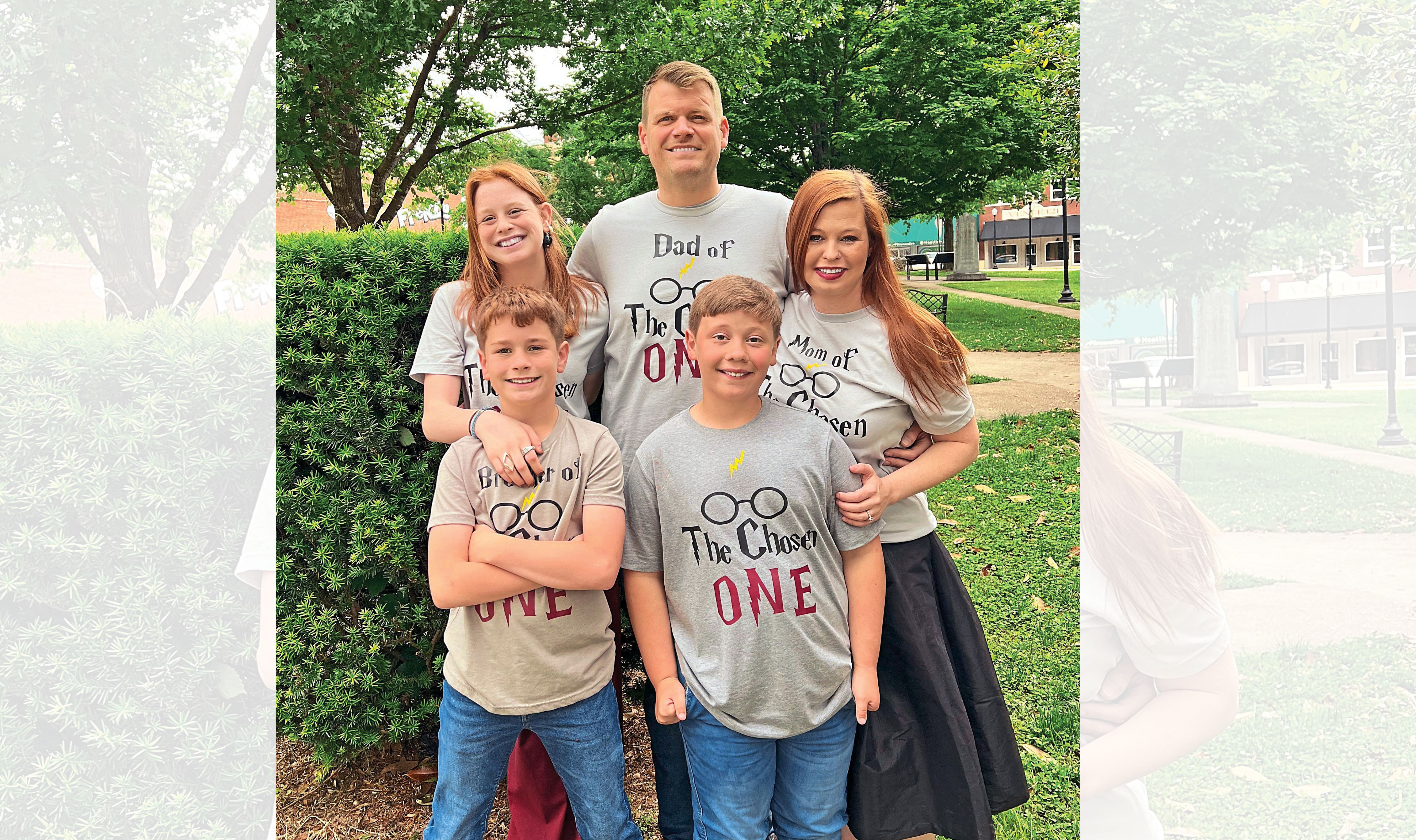 Luke (front, right) says he feels happy and excited to be part of the Kissinger family