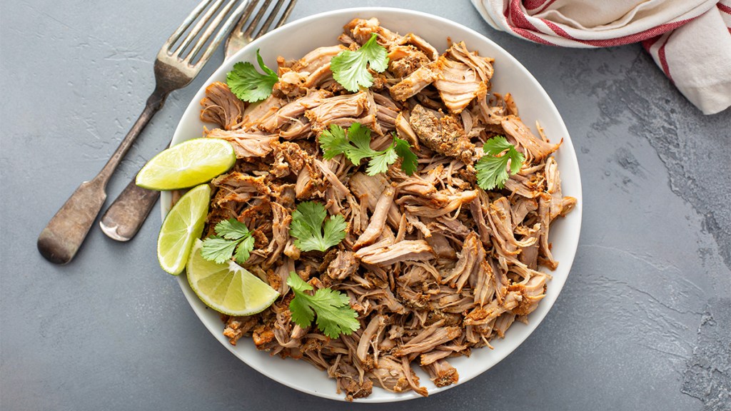 Dutch oven-braised pork carnitas with cilantro and lime