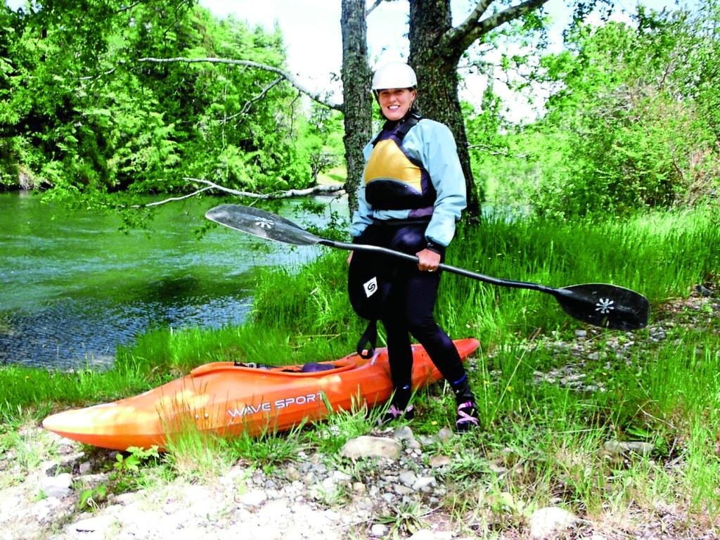 Mary Neal with Kayak