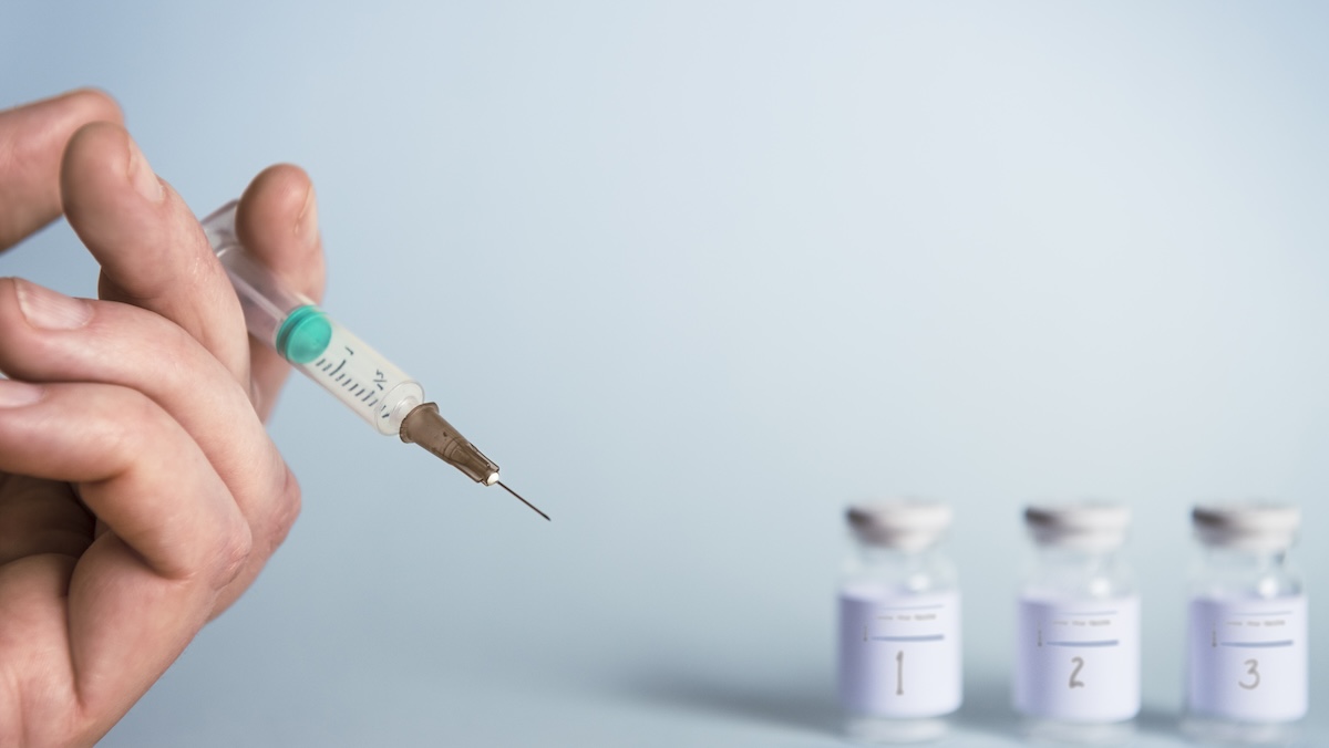 Person choosing between semaglutide and tirzepatide medications.