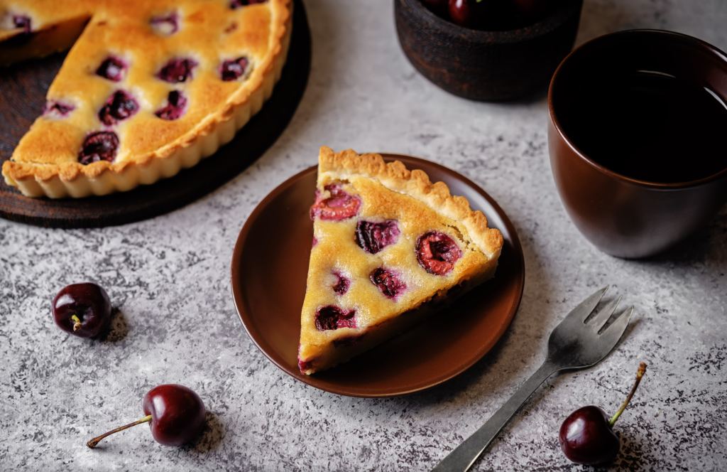 Cherry frangipane tart on a plate