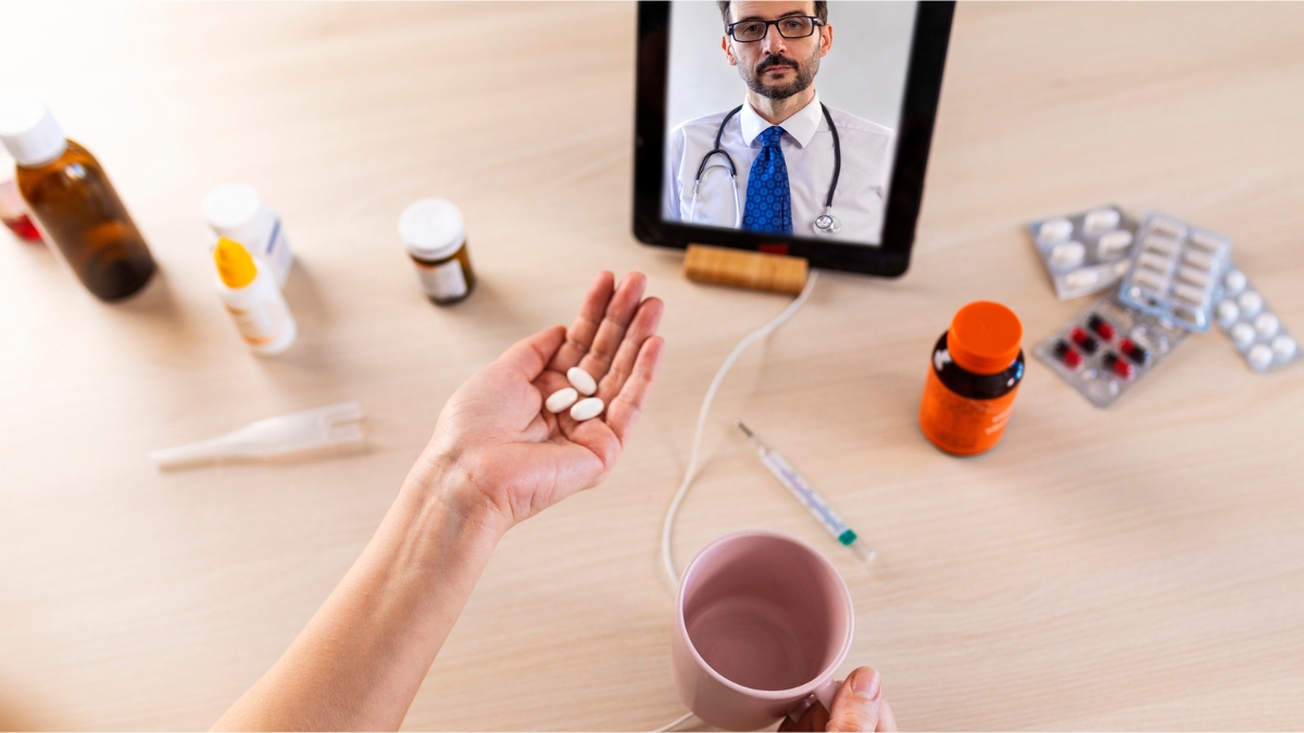 a doctor speaks to his patient via telehealth viritual consolutation about GLP-1 medication