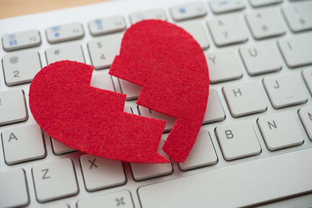 red broken heart on keyboard