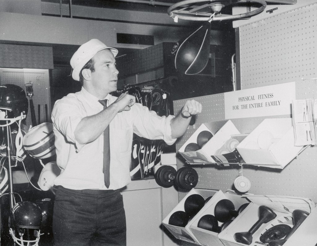 Lone Star in a State. Bill tests gym equipment in a New York department store. He later installed some equipment in his TV studio dressing room so that he can get some exercise when he has the time.
