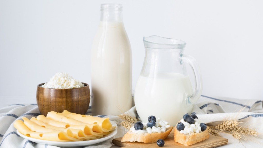 Dairy products such as milk and cheese on a table