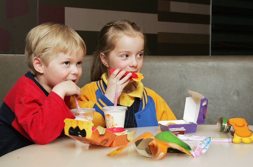 Two children eating a Happy Meal, 2006