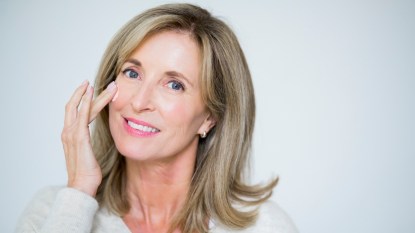 Mature woman with glowing, beautiful skin from doing notox treatments