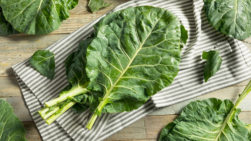 Raw collard greens that are about to be cooked in an instant pot