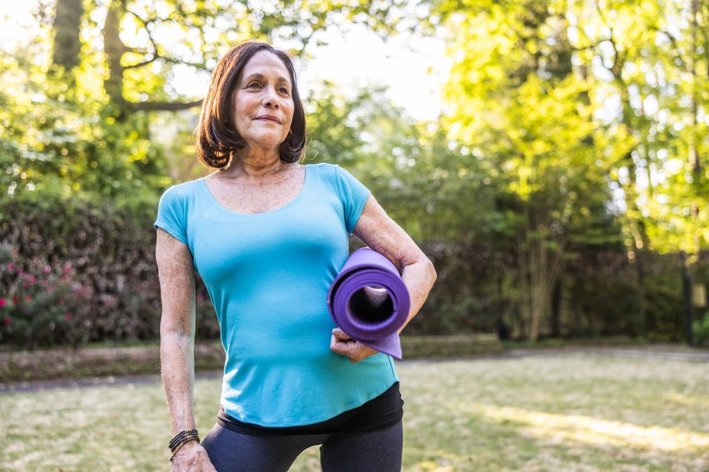 mature woman exercising to prevent weight regain from cellular memory