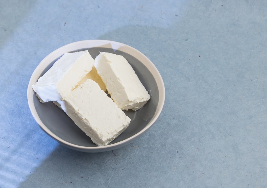 bowl of cream cheese blocks