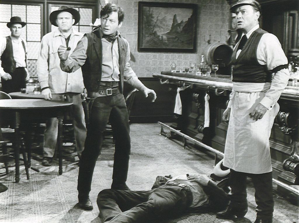 Right until Star Trek began, DeForest Kelley found himself cast in a variety of Westerns, usually as a bad guy. Here he's in a scene from the 1965 film Apache Uprising.