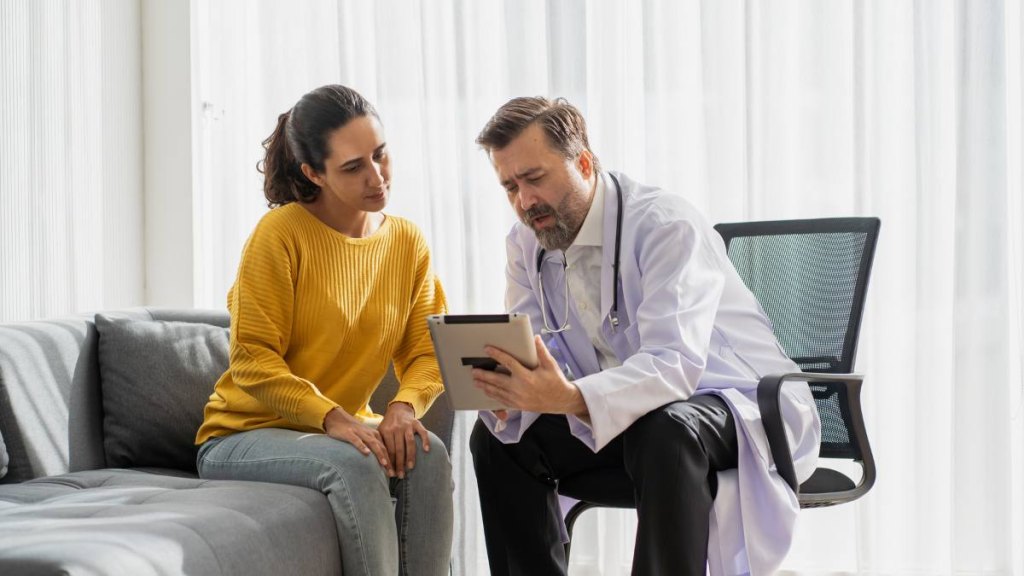 Woman talking to her doctor
